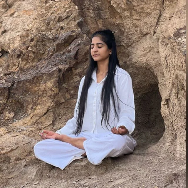 Veena Bhatiwal practising yoga outdoors